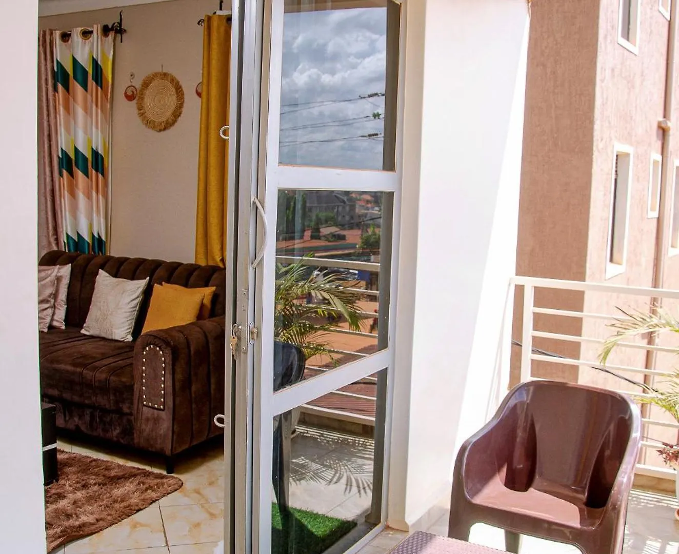 Muggiez Olive, Kira Apartment Kampala Uganda